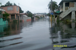 Flooded street by the Caño Martín Peña