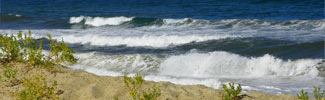 Waves crashing on a sandy shore
