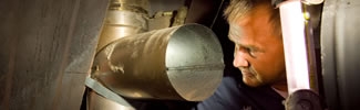 A ventilation duct and HVAC repairman