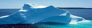 An iceberg floating in the ocean