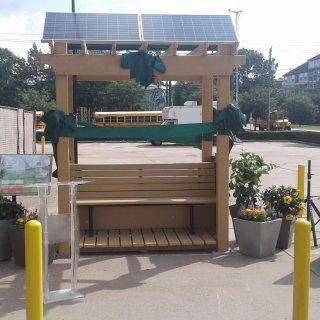 EPA's latest Village Green bench is wrapped in ribbon.
