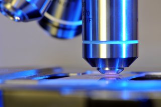 the lens of a microscope