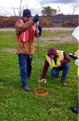 The field crew performs a penetration test using a single mass penetrometer. Photo credit: Tetra Tech.