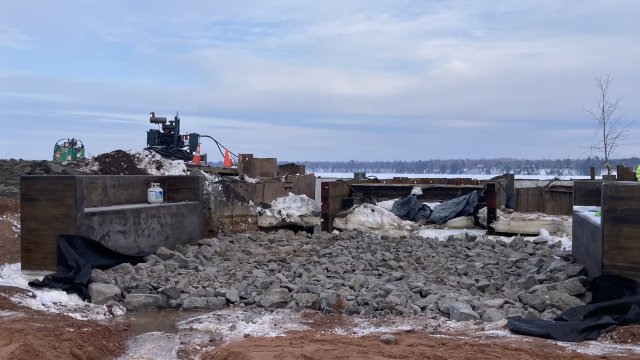 Construction work on railroad bridge and [edestrian bridge.