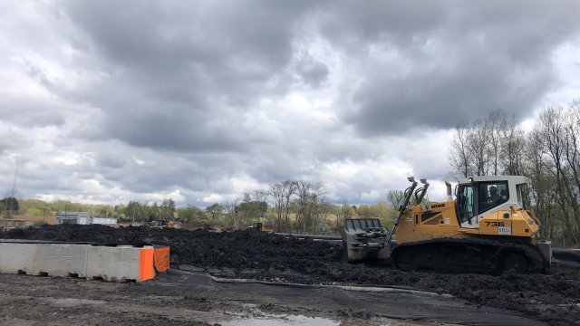 Bulldozer moving soil