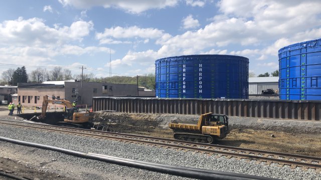 Heavy machinery working along the north track 