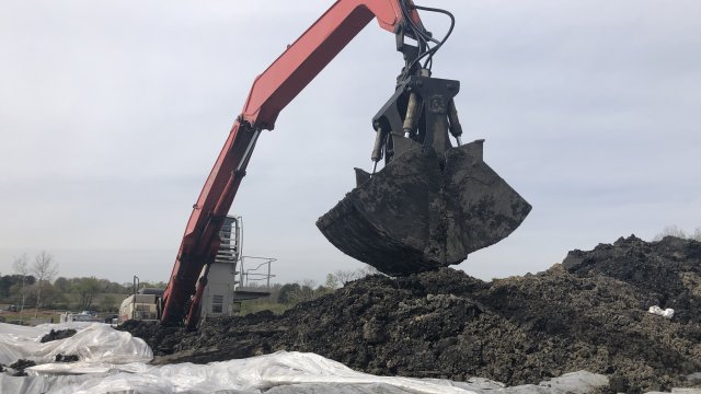 Heavy machinery consolidating soil 