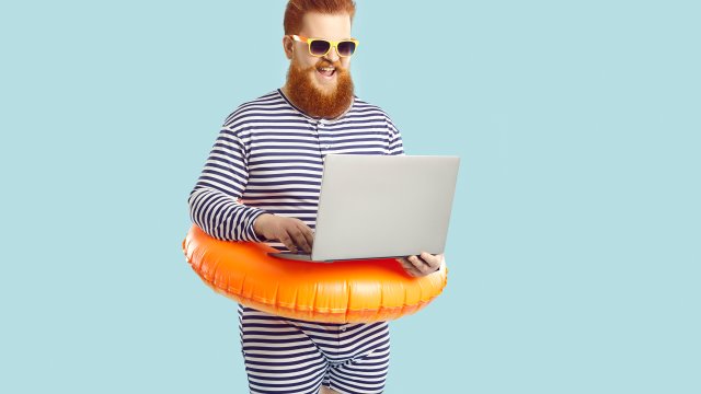 Man in tube with laptop