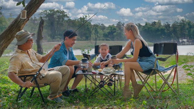 family eating and fishing