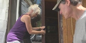 Woman entering her home