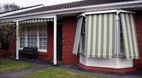 Image of a house with window coverings