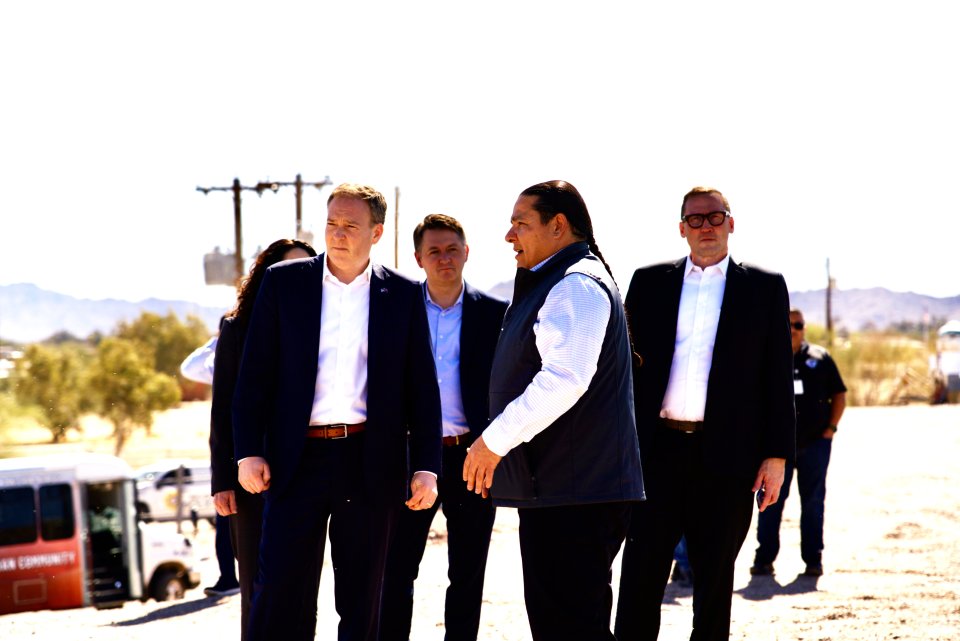 Administrator Zeldin listens to an Ak-Chin Indian Community representative during a daytime site visit, as EPA staff stand in the background