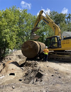 Two 10,000-gallon gasoline tanks being removed from the site in May 2023.