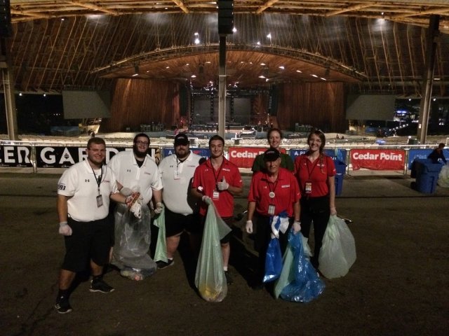 This is a picture of a group of people cleaning up at Blossom Music Center.