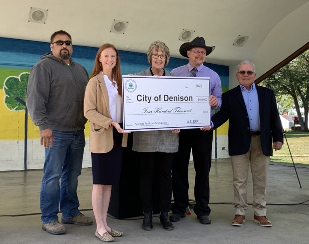 U.S. EPA Region 7 Administrator Meg McCollister is joined by Denison Mayor Pam Soseman, City Manager Bradley Hanson, regional leaders, and community members during a big check presentation at Denison, IA, Sept 30, 2022.