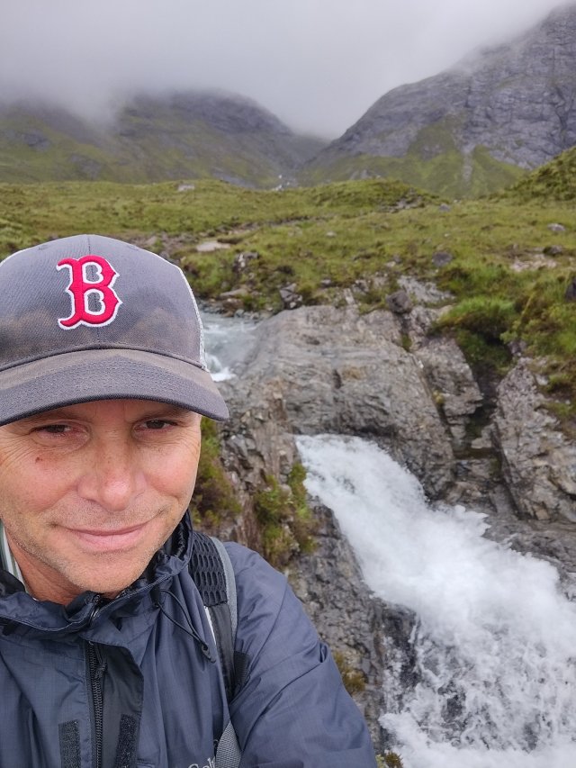 John S. Iiames standing near a river.