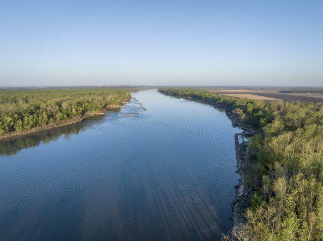 Aerial view of Missouri River with trees on banks.