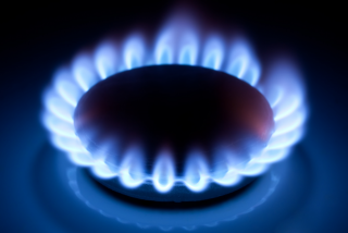 Flame on a gas stove burner.