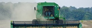 Harvester in a field