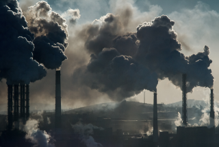 Image of smokestacks at an industrial facility