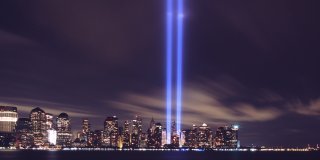 Skyline of New York City with memorial lights in place of the twin towers
