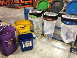 Photo of multiple recycling bins.