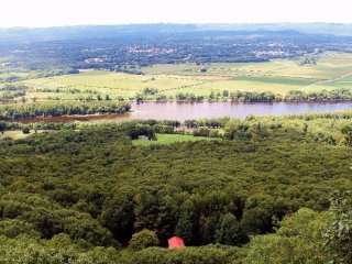 A section of Connecticut River that is surrounded by agricultural fields