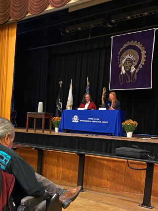 EPA Region 7 Administrator Meg McCollister and Haskell Indian Nations University Interim President Julia Good Fox sign a Memorandum of Understanding (MOU) formalizing the organizations’ partnership to promote environmental outreach and student career opportunities during the signing ceremony at Haskell Auditorium on Oct. 19, 2022.