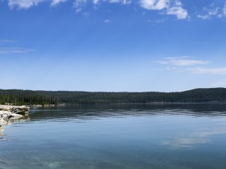 Water Quality Benefits RFA - image big body of water with surrounding greenery.