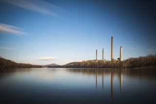 Photo of a power plant on a river
