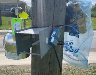 Air monitor and sampling equipment on a utility pole in the community
