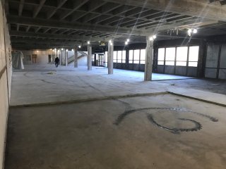 A look into the main building as the renovation begins—only the support beams, floors, and outside walls remained after the demolition.