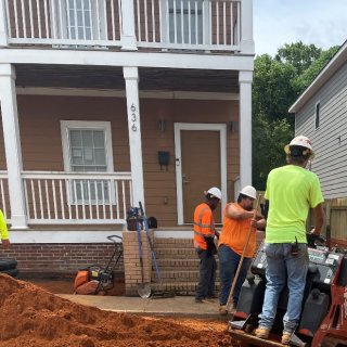 Workers remediating a home