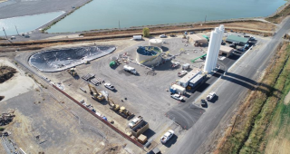 The figure is a photo of the lime softening facility used to treat the reuse water.