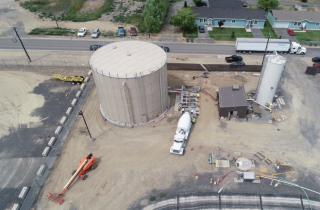 The figure is a photo of the permeate tank, where water treated through reverse osmosis is stored prior to reuse.