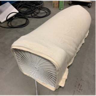 Portland State University’s Solution that uses a large, tube-shaped, washable fabric filter combined with a box fan to create a low-cost air cleaning device. 