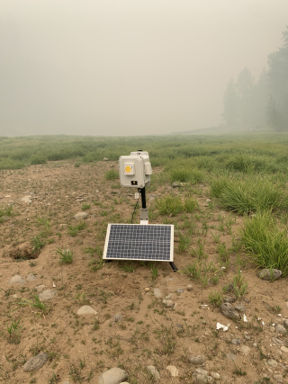 Photo of a Multipollutant Air Sensor take by Amara Holder on a smoky day in the field.