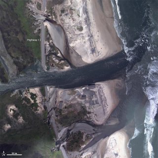 Ocean flooding crosses highway.