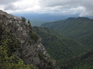 A scenic view of mist hanging over the Great Smoky Mountains.