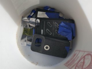 electronic waste in a bucket