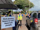 Kaua‘i Department of water handing out resource kits during a COVID-safe drive-through event.