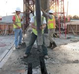 Concrete being poured at a construction site