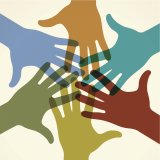 Colorful image of hands reaching together in a circle 